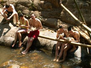 Tour group group having a break in the mountains of