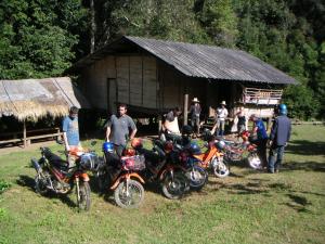 Tour group at hilltribe hut